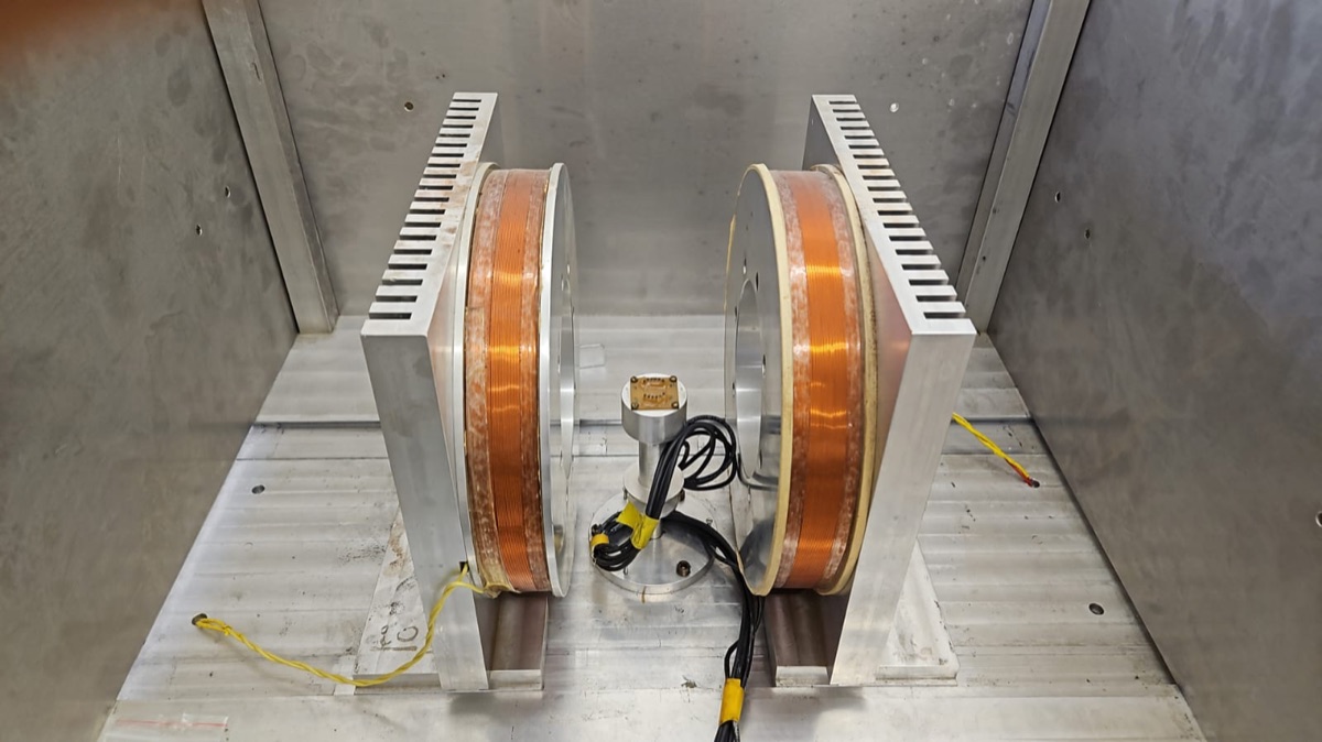 Helmholtz coil pair inside a magnetically shielded chamber